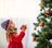 Child in awe of Christmas tree