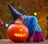 little girl looking inside a pumpkin