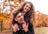 Happy friends laughing in autumn park Mastercard Gift Card