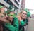 young girls smiling at St. Patrick's day parade