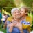 Daughter hugging mother on a Visa gift card