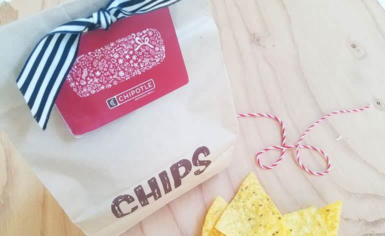 Chipotle gift card on a bag of chips