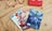 Three Visa gift cards on a table