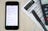 image of phone app, a document and calculator
