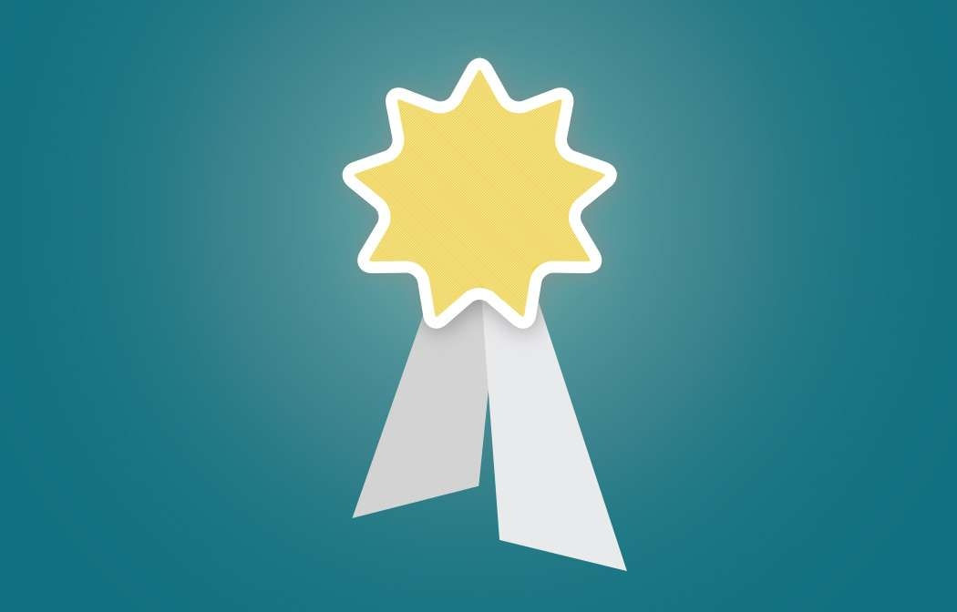Yellow star-shaped award ribbon with two white tails on a teal background.