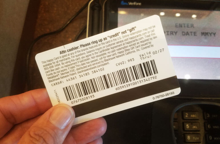 Back of a Happy Card, stating to run as credit